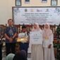 Penyaluran zakat perusahaan dan santunan kepada anak-anak yatim.